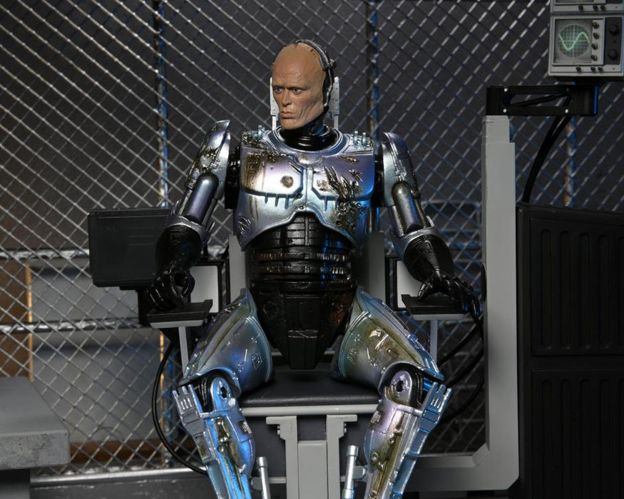 ROBOCOP 7" ULTIMATE BATTLE DAMAGED ROBOCOP WITH CHAIR FIGURE