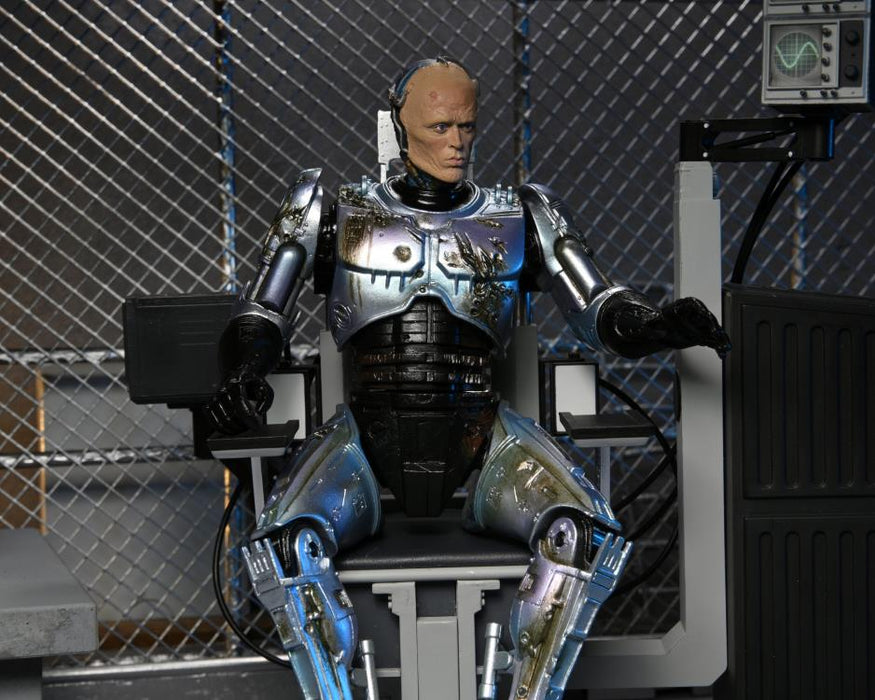 ROBOCOP 7" ULTIMATE BATTLE DAMAGED ROBOCOP WITH CHAIR FIGURE